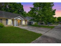 Charming single-Gathering home featuring a well-maintained lawn and inviting front porch at 207 Allen Richard Ct # B, Moncks Corner, SC 29461