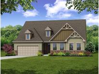 Charming home with beautiful landscaping, a two-car garage, and a classic craftsman design at 254 Huguenot Trl, Huger, SC 29450