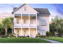Charming two-story home with a quaint porch, manicured lawn, and lush landscaping at 2056 Ten Point Dr, Charleston, SC 29492