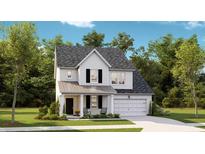 Charming two-story home featuring white siding, black shutters, and a covered front porch, nestled among mature trees at 1033 Tea Time Dr, Summerville, SC 29485