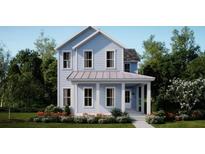 Charming two-story home with light-blue siding, white trim, and a welcoming front porch at 109 Battle Boat Blvd, Summerville, SC 29485