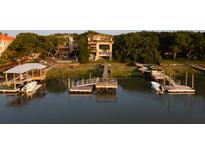 Stunning waterfront property with boat docks and luxurious amenities offering coastal living at 905 Palm Blvd, Isle of Palms, SC 29451