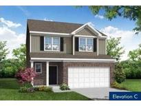 Charming two-story home with a brick and siding exterior and a two-car garage at 112 Shingle Oak Dr, Moncks Corner, SC 29461