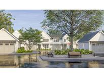 Charming exteriors showcasing craftsman-style architecture with lush landscaping and inviting curb appeal at 409 Oak Hammock Ct # 50, Johns Island, SC 29455