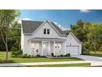Charming two-story home with white siding, a well-manicured lawn, and an attached two car garage at 84 French Garden Cir, Summerville, SC 29486