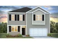 Charming two-story home with black shutters and a pristine two car garage at 265 Wild Strawberry Ln, Moncks Corner, SC 29461