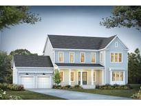 Charming two-story home with a welcoming front porch and attached two-car garage at 409 Wood Lilly Loop, Summerville, SC 29486