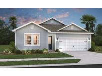 Charming one-story home with light gray siding, a two-car garage, and a well-manicured lawn at 2046 Mcguire Ln # 012, Hollywood, SC 29449