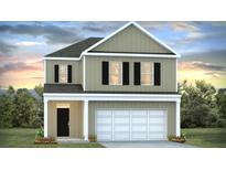 Charming two-story home with a white garage door, complemented by a well-maintained lawn and appealing curb appeal at 413 Mistflower Ln, Moncks Corner, SC 29461