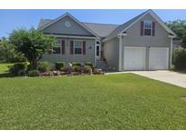 Charming single-Gathering home with a well-manicured lawn and a two-car garage at 114 Sea Cotton Cir, Charleston, SC 29412