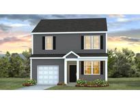 Charming two-story home with gray siding, black shutters, and a one-car garage with manicured landscaping at 317 Salvia Sq, Moncks Corner, SC 29461