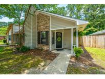 Charming single-Gathering home featuring a brick facade and a well-manicured lawn at 717 Temple Road # B, Ladson, SC 29456