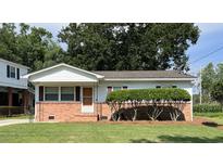 Charming single-story home with brick foundation, tidy landscaping, and a well-manicured lawn at 105 Pandora Dr, Goose Creek, SC 29445