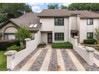 Charming townhome with striped driveway and tasteful landscaping at 321 Lapwing Ln, Mount Pleasant, SC 29464