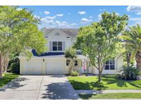 Charming two-story home with a well-maintained lawn, two-car garage, and welcoming curb appeal at 434 Antebellum Ln, Mount Pleasant, SC 29464