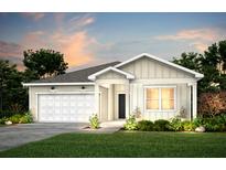 Charming one-story home with a two-car garage, verdant lawn, and meticulously manicured landscaping at 766 Meadowbrook Lane, Summerville, SC 29486