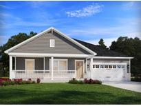 Charming single-Gathering home features a covered front porch and two-car garage on a well-manicured lawn at 423 Radiant Blue Way, Summerville, SC 29486
