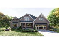 Charming craftsman-style home featuring a well-manicured lawn, gray siding, and eye-catching curb appeal at 0 Doar Rd, Awendaw, SC 29429