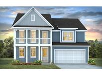 Charming two-story home featuring a front porch, attached garage, and blue siding at 135 Lilac Grove Way, Summerville, SC 29486