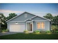 Charming single-story home featuring a two-car garage, well-maintained lawn and attractive architectural details at 753 Meadowbrook Ln, Summerville, SC 29486