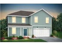 Charming two-story home features a welcoming front porch and an attached garage at 755 Meadowbrook Ln, Summerville, SC 29486