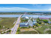 Beautiful aerial view of the condo complex and surrounding waterways of Unit 1G at 2393 Folly Rd # 1G, Folly Beach, SC 29439
