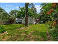 Charming single-story home with a tree-lined front yard and inviting curb appeal at 638 Cashew St, Charleston, SC 29407