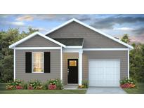 Charming single-story home featuring a symmetrical design, neutral siding, and a one-car garage at 8840 Shovelnose Ct, North Charleston, SC 29406