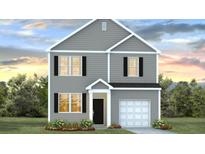 Charming two-story home with gray siding, black shutters, and manicured landscaping at 8854 Shovelnose Ct, North Charleston, SC 29406