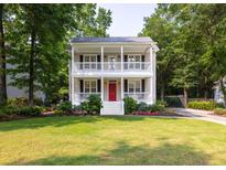Charming two-story home with double porches and lush landscaping at 1116 Sea Island Crossing Ln, Mount Pleasant, SC 29464