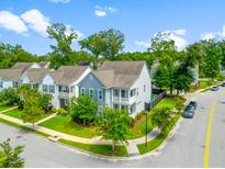 Beautiful aerial view of the neighborhood with sidewalks and mature trees giving a park-like setting at 1928 Mossdale Dr, Johns Island, SC 29455
