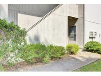 Attractive condo with well-maintained landscaping and exterior stairs to the front entrance at 1104 Greenmeadow Dr, Goose Creek, SC 29445