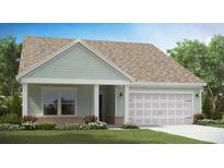 Charming one story home featuring light green siding and a two car garage at 544 Verdi Drive Dr, Summerville, SC 29486