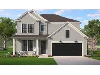Charming two-story home features a black garage door, stylish black window frames, and a well-manicured lawn at 8629 Connor Ct, North Charleston, SC 29406