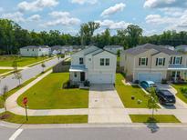 Charming two-story home with a well-manicured lawn and inviting curb appeal in a Gathering-friendly neighborhood at 602 Jancus St, Charleston, SC 29414