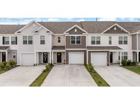 Charming townhomes with attached garages and modern exteriors in a well-maintained community at 266 Ivory Shadow Rd, Summerville, SC 29486