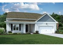 Charming single-Gathering home featuring a well-manicured lawn and an attached two-car garage at 593 Marsh Cove Cir, Summerville, SC 29486