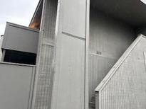 View of the building's exterior siding, steps, and the number '806' displayed above the staircase at 806 Greenmeadow Dr, Goose Creek, SC 29445