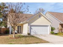 Charming single Gathering home with a two car garage and cozy front porch at 1516 Oldenburg Dr, Mount Pleasant, SC 29466