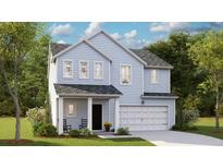 Charming two-story home featuring light blue siding, covered porch with rocking chairs, and an attached two-car garage at 114 Lefton Lndg, Summerville, SC 29485