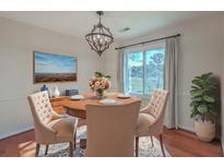 Elegant dining room with hardwood floors and chandelier lighting at 1158 Village Creek Ln # 4, Mount Pleasant, SC 29464