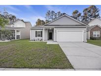 Charming single-Gathering home with a two-car garage and a well-manicured lawn in a suburban neighborhood at 278 Decatur Dr, Summerville, SC 29483