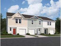Charming townhome exterior featuring varied siding, attached garages, and manicured lawns, creating an inviting curb appeal at 475 Colchester Ct, Moncks Corner, SC 29461