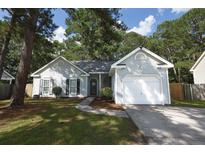 Charming single-story home featuring a well-manicured lawn and attached one car garage in a desirable neighborhood at 714 Alwyn Blvd, Summerville, SC 29485