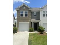 Charming townhome with a one-car garage, tidy landscaping, and a classic exterior color scheme at 113 Cozy Nest Way, Summerville, SC 29483
