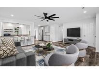Bright living room featuring an open floor plan, modern furnishings, and stylish decor at 207 Terry Ave, Summerville, SC 29485