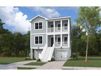 Charming two-story home featuring a double stacked porch and a two-car garage at 3170 Vanessa Lynne Ln, Johns Island, SC 29455