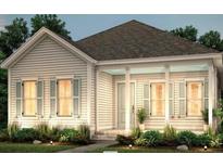 Charming single-story home featuring a covered front porch and light-colored siding at 313 Trailmore Ln, Summerville, SC 29486