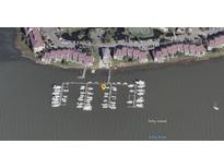 An aerial view of the community marina, with boat slips available for residents and easy access to Folly River and Folly Island at 2 Mcdonough Rd # C-20, Folly Beach, SC 29439