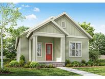 Charming single-story home features a covered porch, red door, and tidy landscaping at 226 Clearpath Dr, Summerville, SC 29486